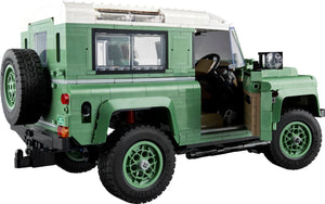 Green toy SUV with open door on a white background