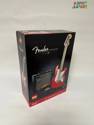Fender Stratocaster guitar and amplifier model in LEGO packaging on a white background