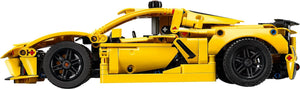 Yellow toy car model on a white background