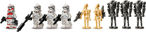 Set of toy figures including stormtroopers and other characters on a white background