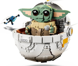 LEGO model of Baby Yoda in a pod with a small drone on a white background