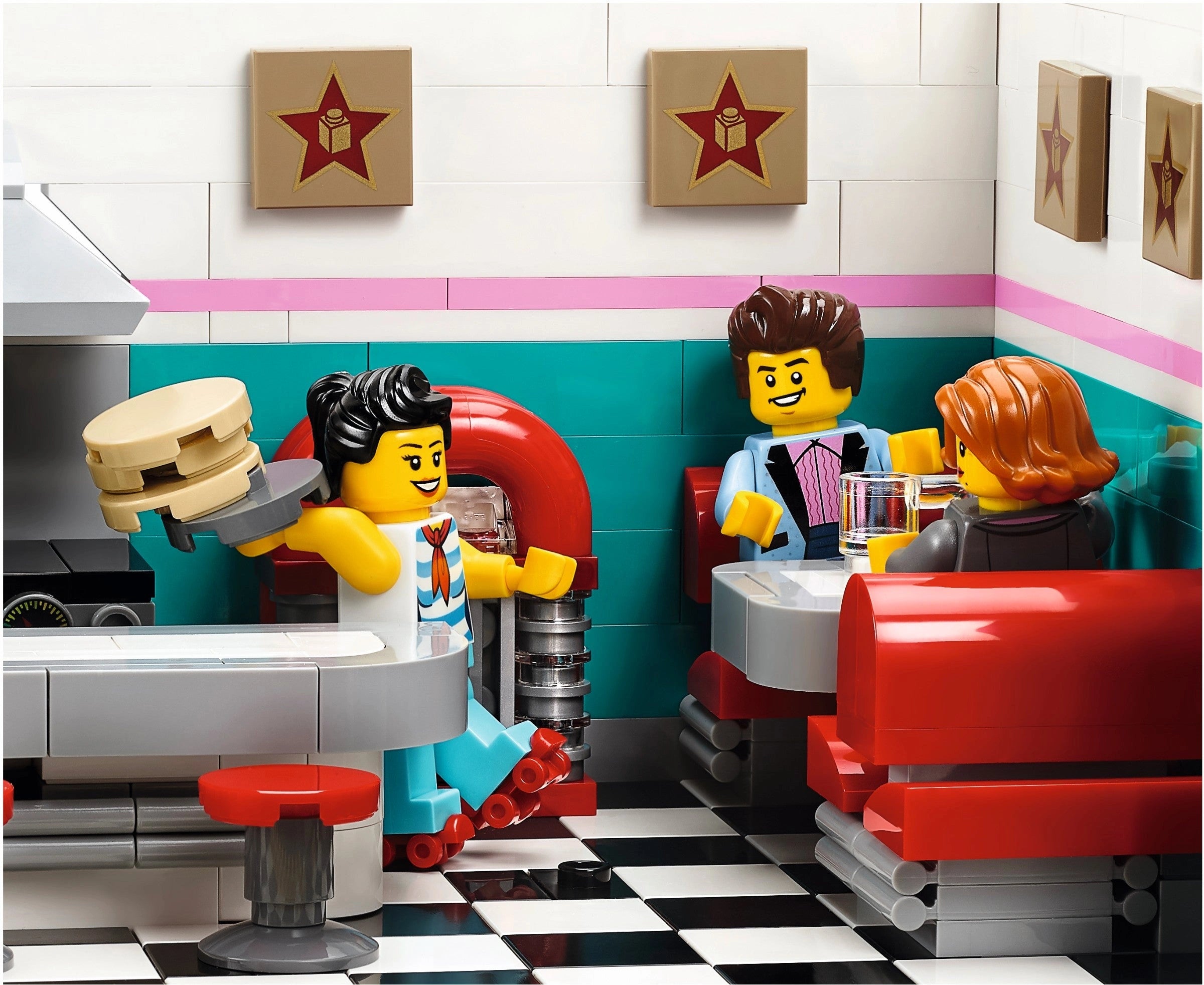 LEGO people in a diner setting with checkered floor and wall decorations.