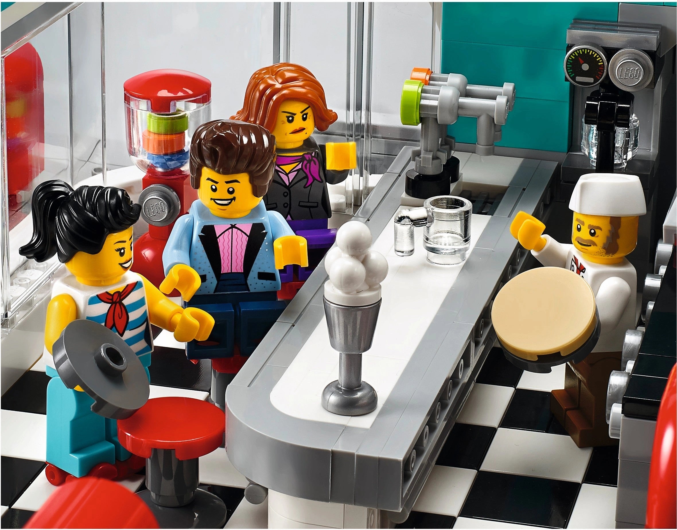 LEGO minifigures in a coffee shop setting with a barista and customers.