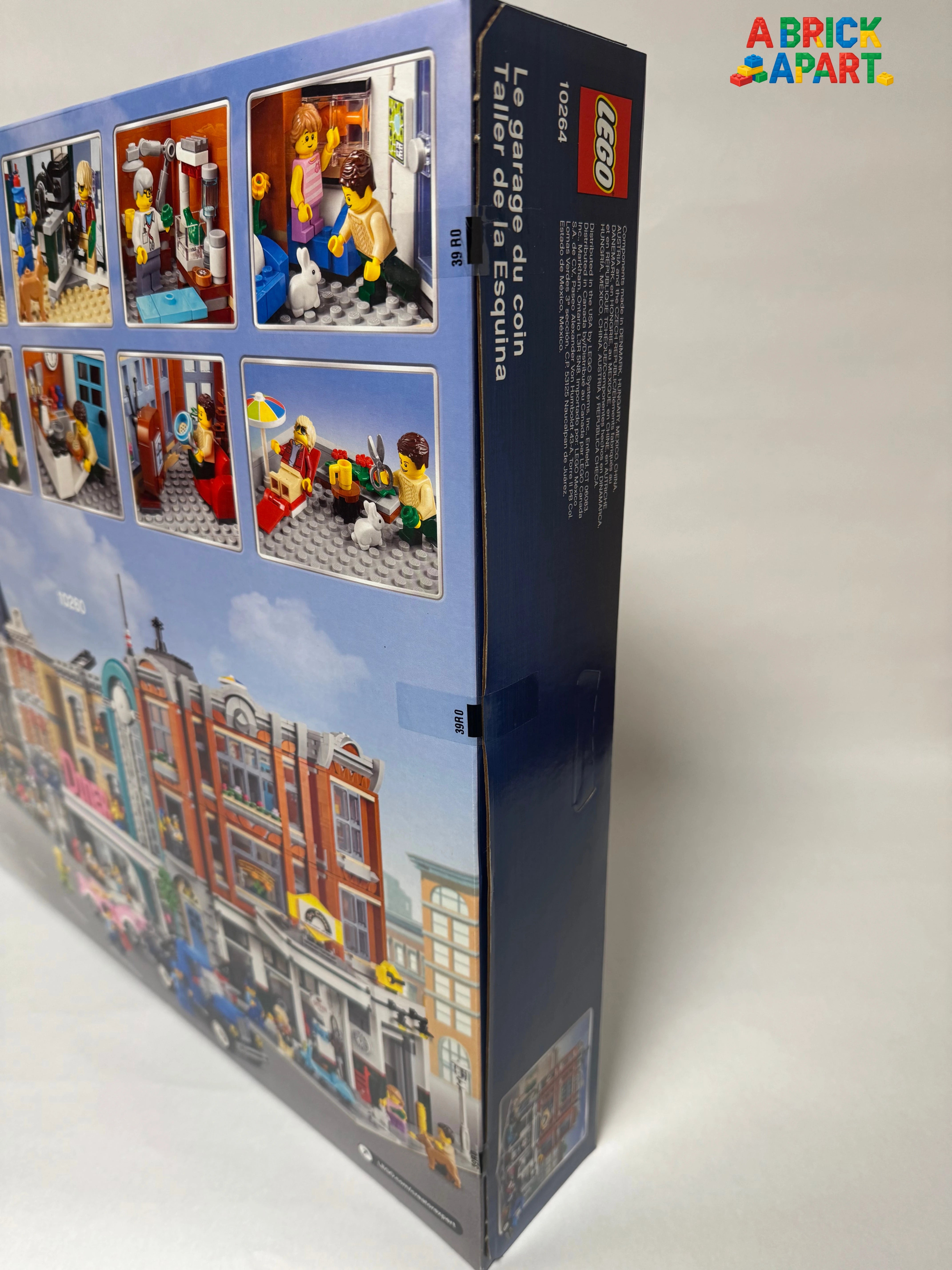 LEGO set packaging with images of minifigures and a cityscape on a white background