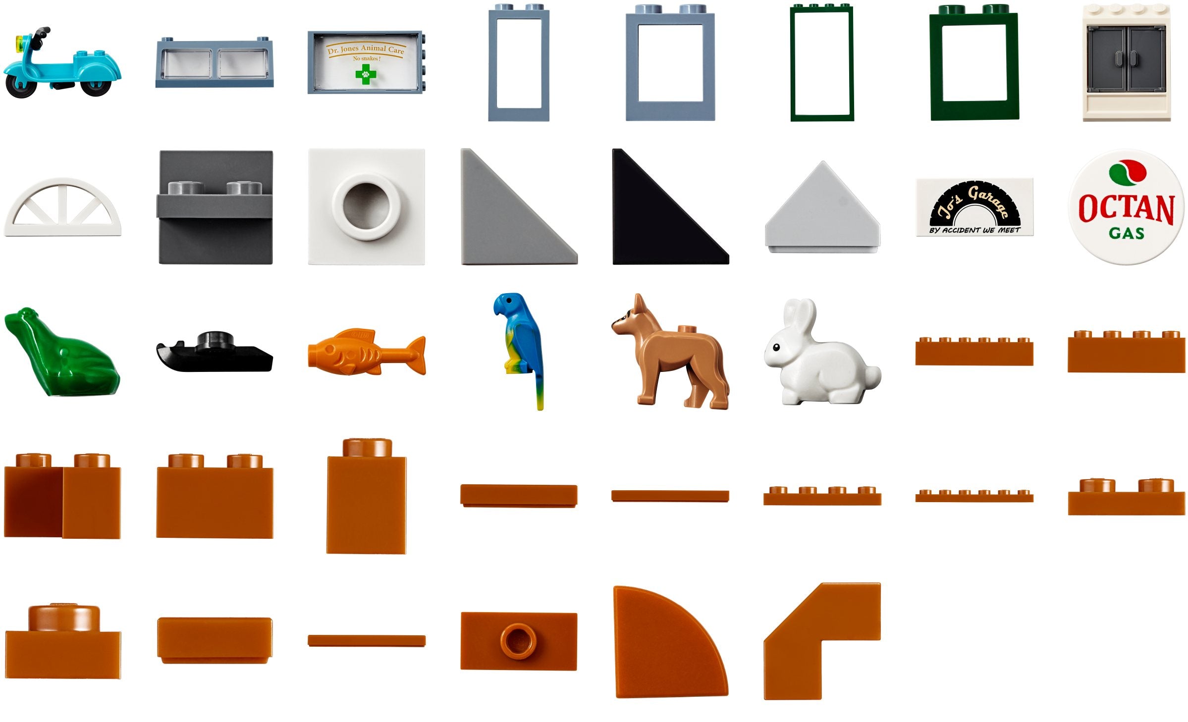 Collection of various toy building blocks and parts on a white background