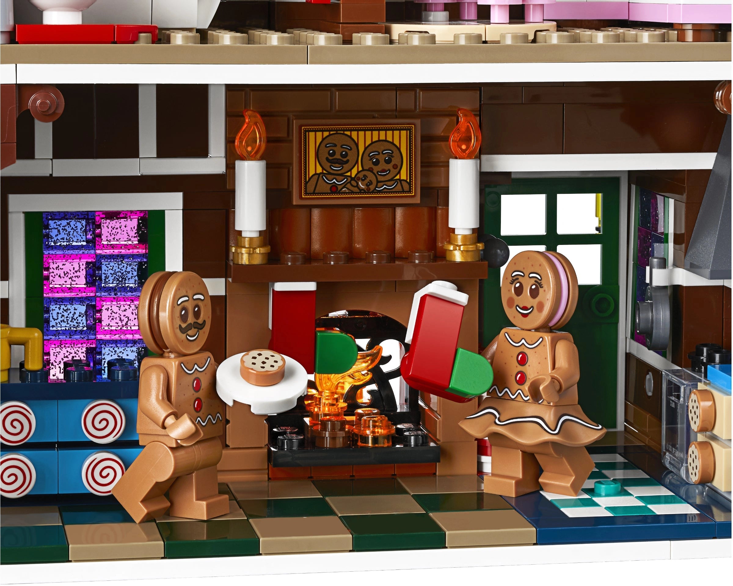 LEGO gingerbread men in a kitchen setting with a fireplace and checkered floor.