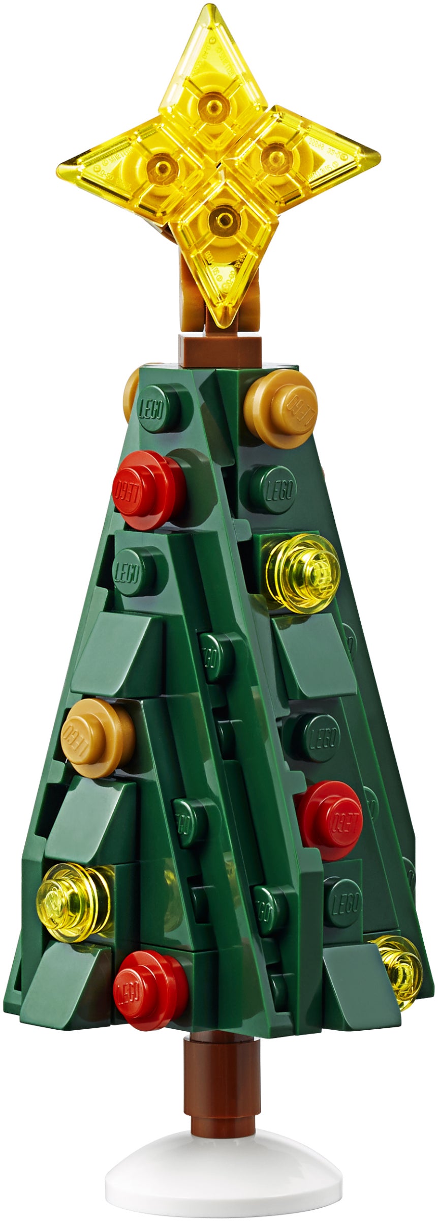 Toy Christmas tree made of interlocking bricks with a star on top, on a white background.