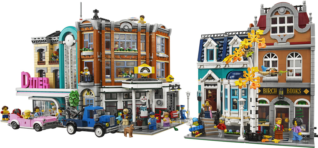 LEGO model of a small town with various buildings and people.