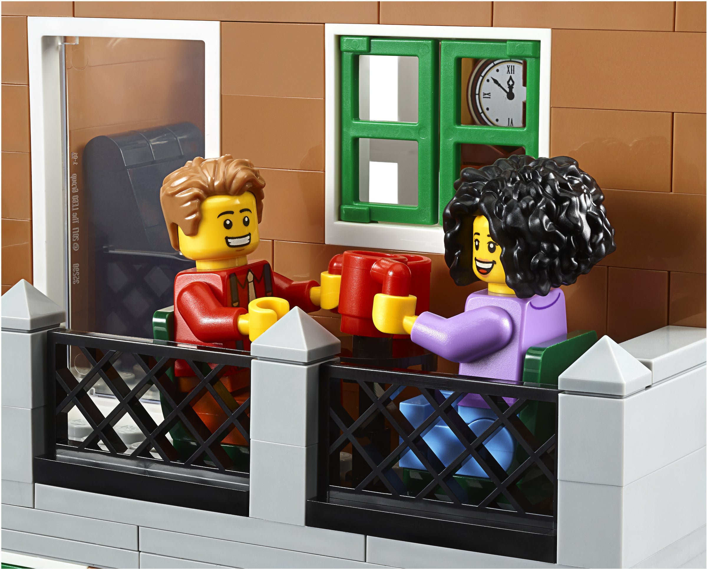 Two LEGO figures in a small fenced area with a clock on the wall.