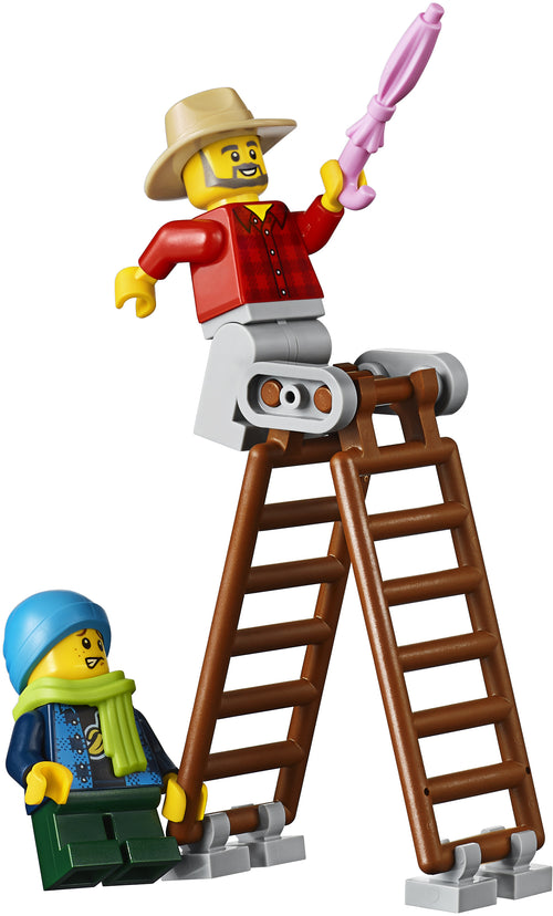 LEGO figure of a cowboy on top of a ladder with another figure below, on a white background