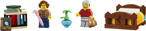 Set of LEGO minifigures and furniture pieces including a bed, chair, and potted plant.