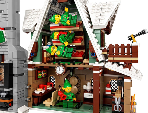 Detailed LEGO model of a shop with various items and characters inside.