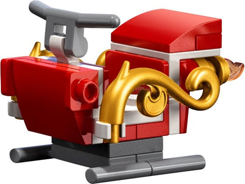 Toy vehicle made of interlocking bricks in red, gold, and gray on a white background