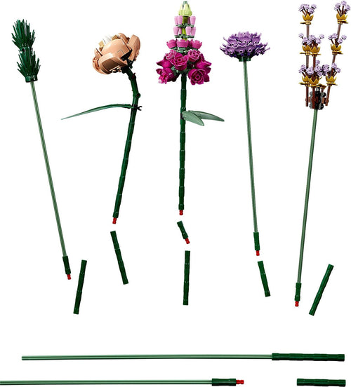 Set of decorative floral sticks with various flower designs on a white background
