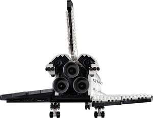 Model of a rocket ship with a white background