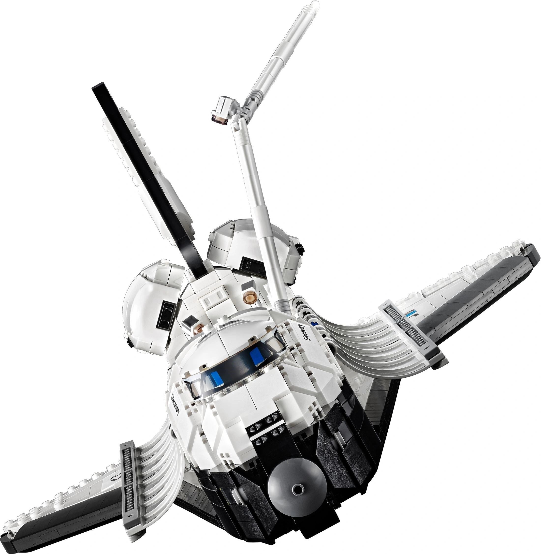 Model of a space shuttle made from interlocking bricks on a white background
