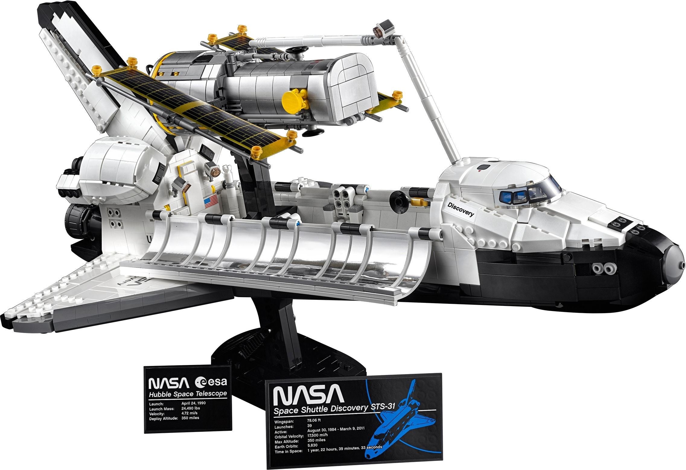 Model of a space shuttle on a stand with NASA branding