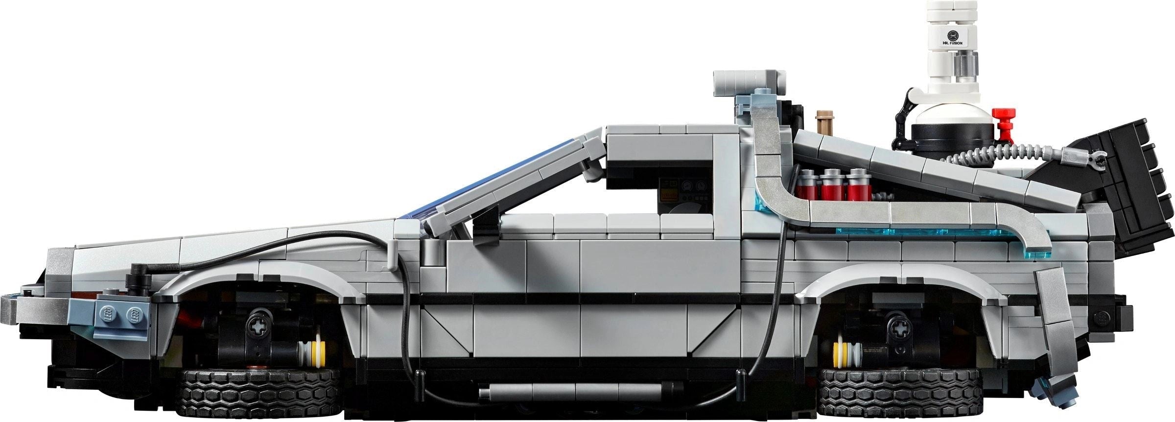 Model of a futuristic vehicle made from interlocking bricks on a white background