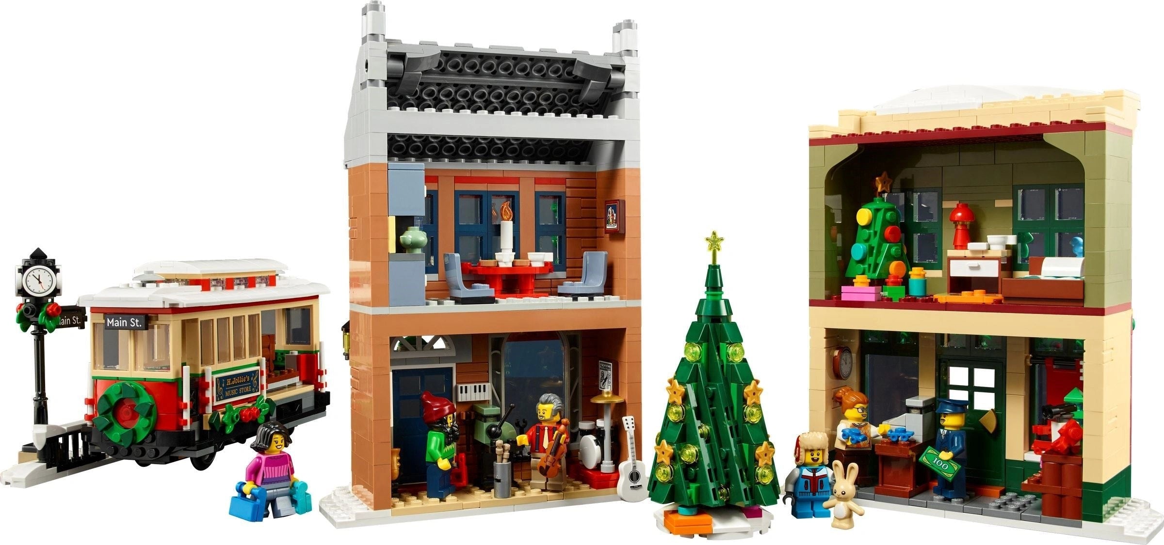 LEGO set of a festive street scene with buildings, a trolley, and Christmas decorations.