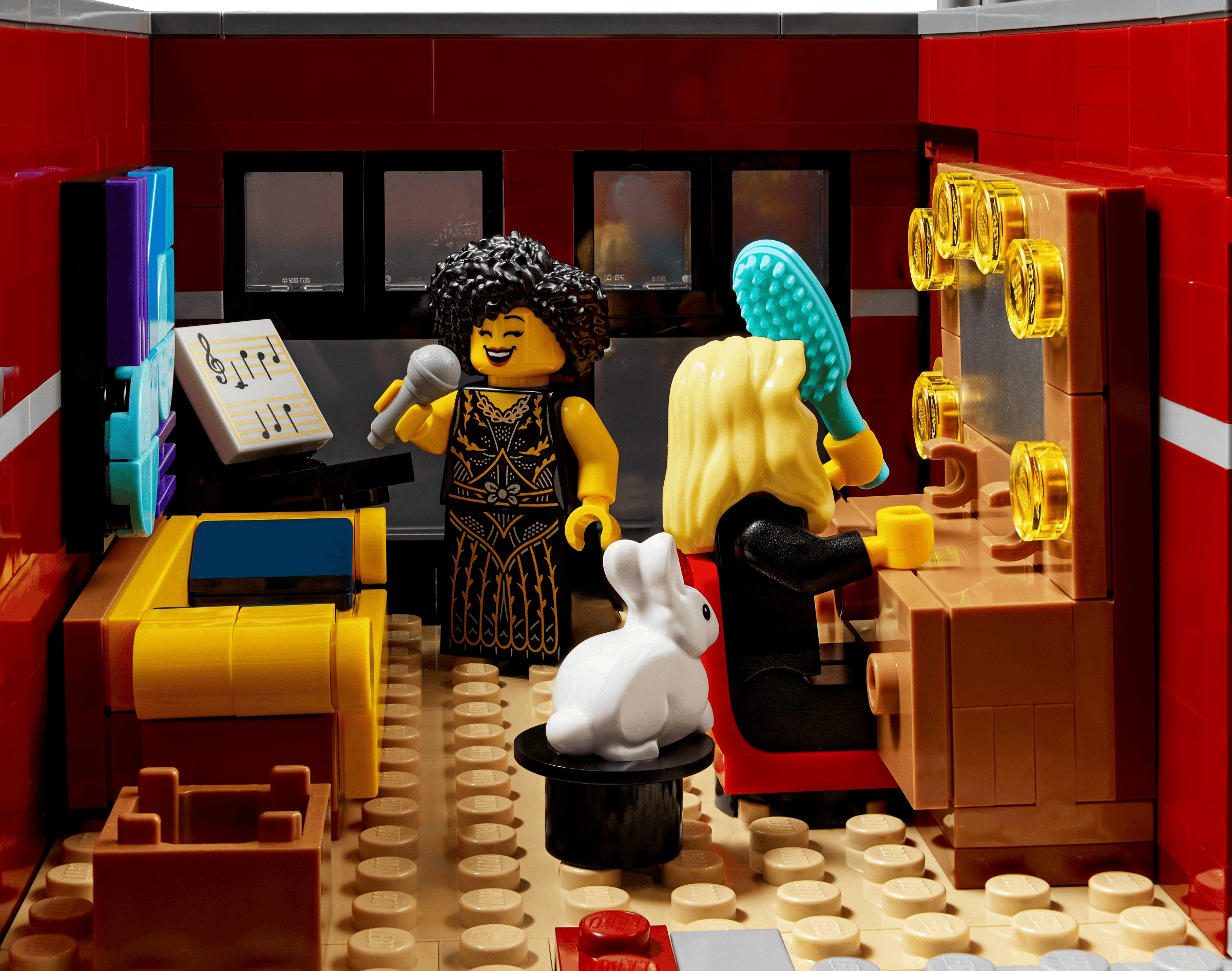 LEGO scene with characters in a room with furniture and decor