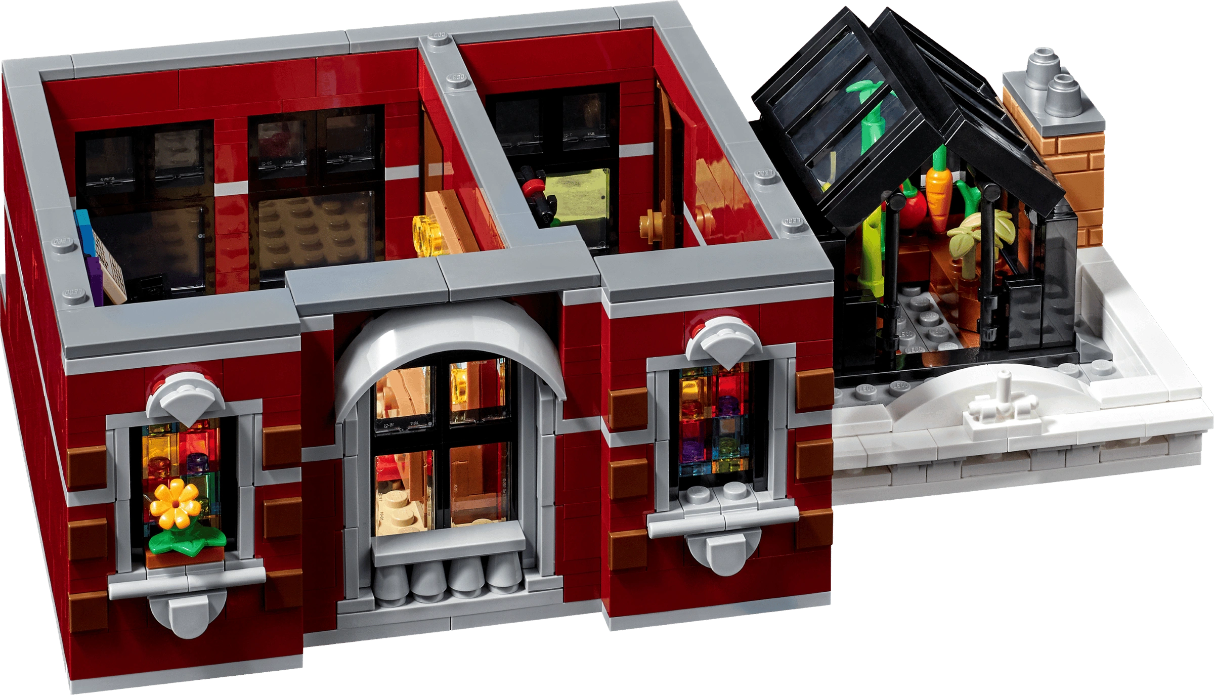 Toy building set with detailed interior and exterior, featuring a red facade and glass windows.