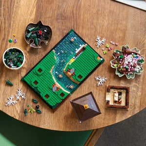 Toy building set on a wooden table with various components.