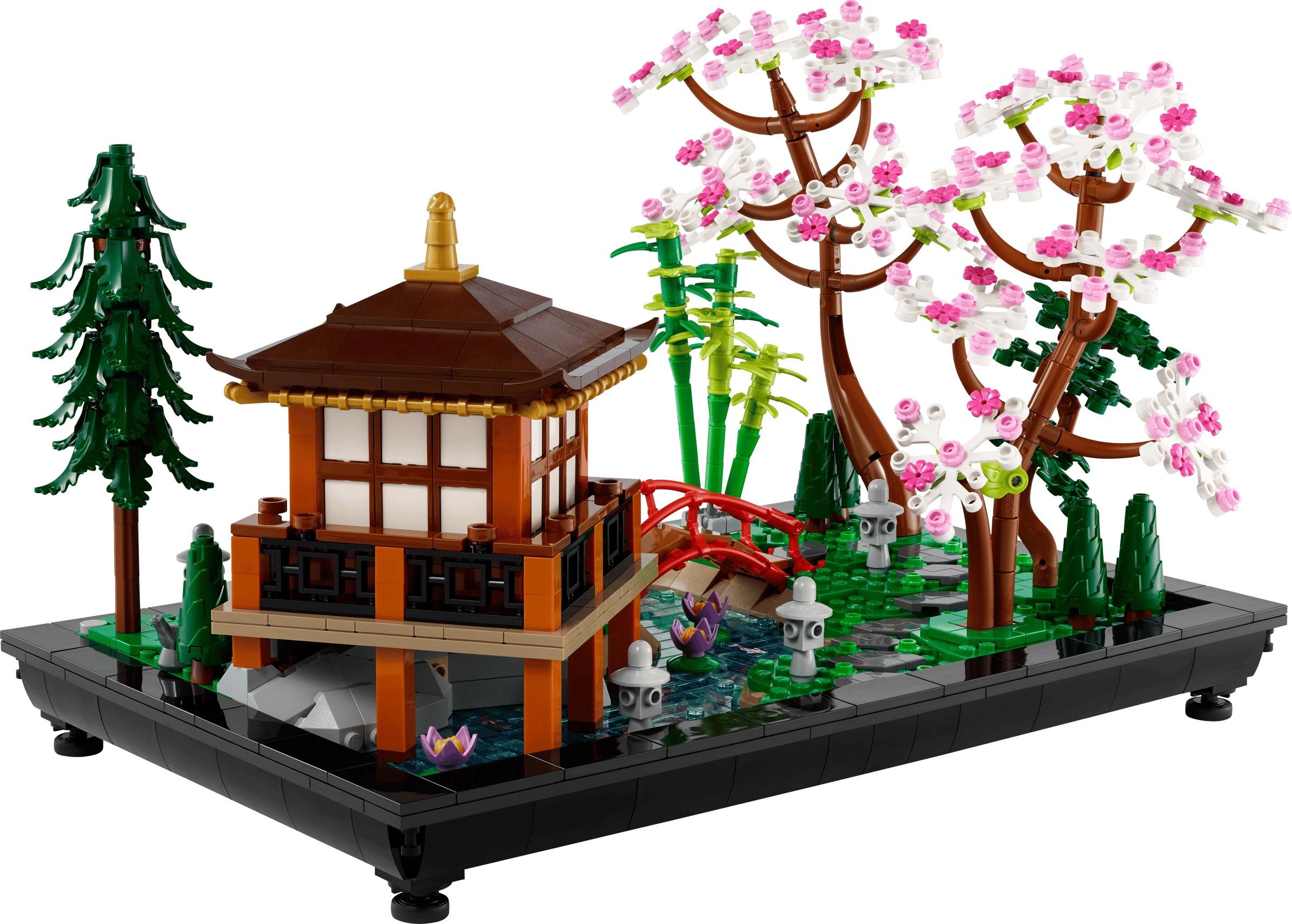 LEGO model of a Japanese-style building with cherry blossom tree and bridge on a transparent background