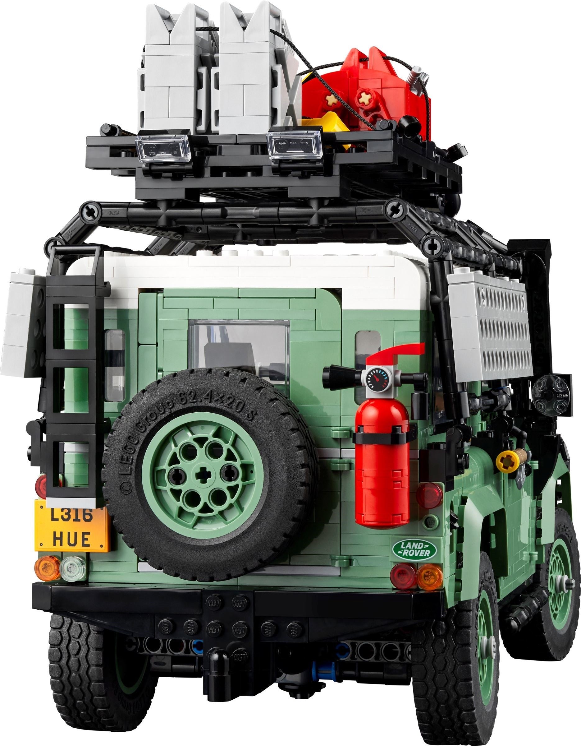 LEGO model of a green vehicle with a fire extinguisher on a white background