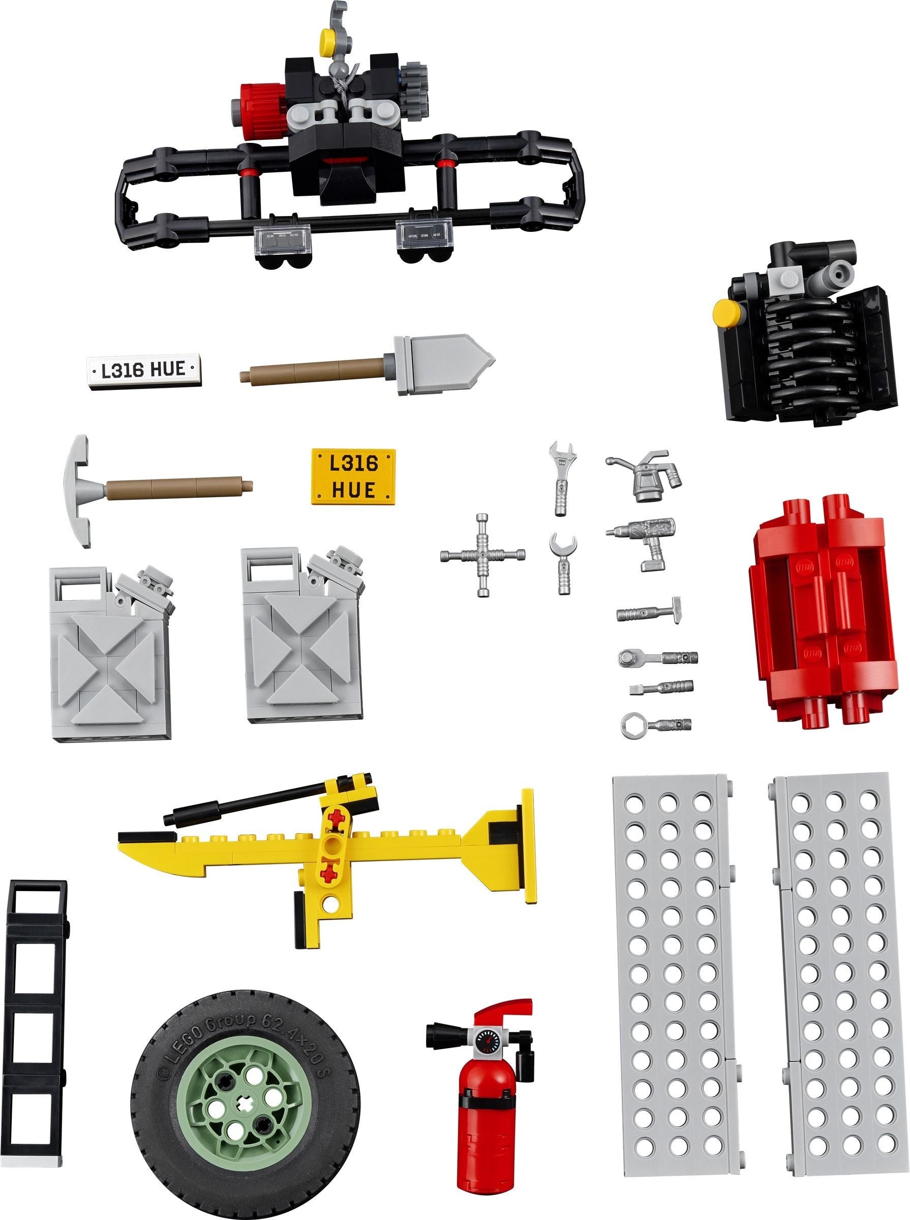 Collection of various toy building blocks and components on a white background