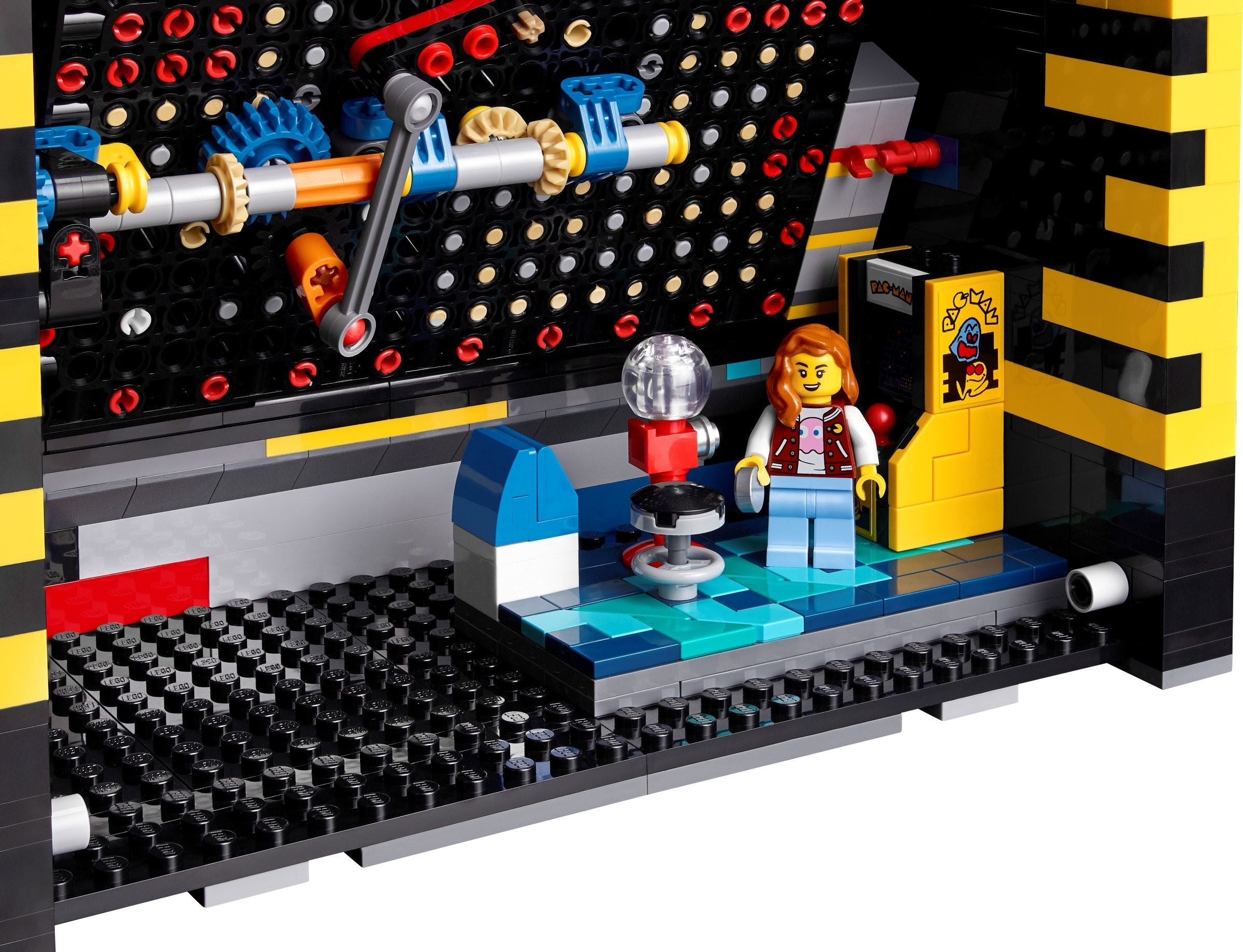 LEGO set with characters and elements on a black baseplate