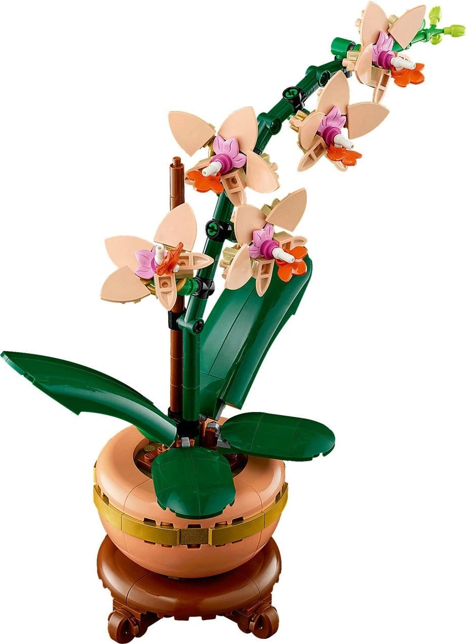 LEGO model of a potted orchid with flowers on a white background
