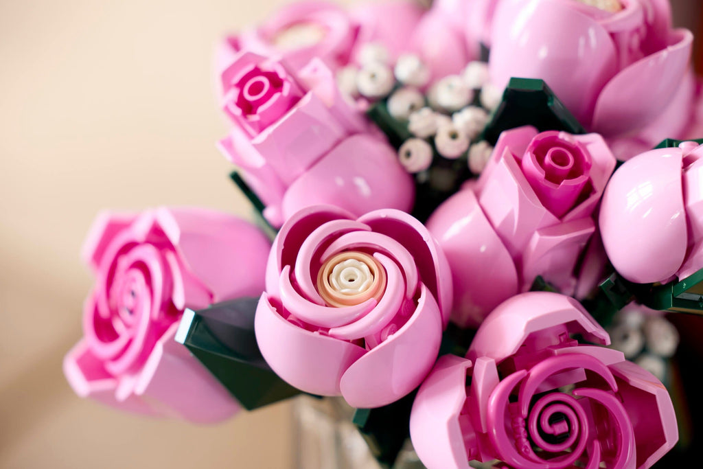 Bouquet of pink artificial flowers with a blurred background