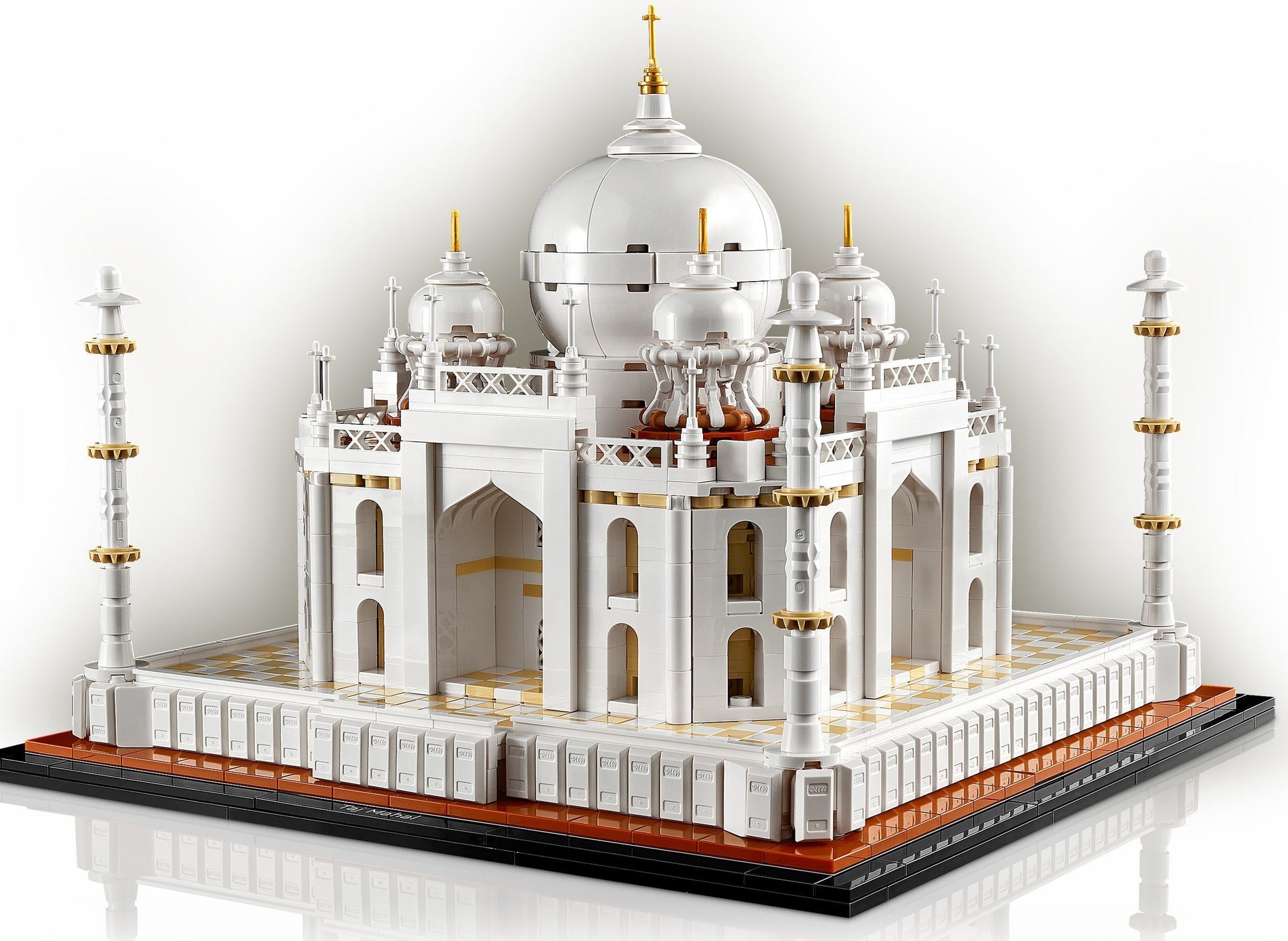 Model of the Taj Mahal made from interlocking bricks on a white background