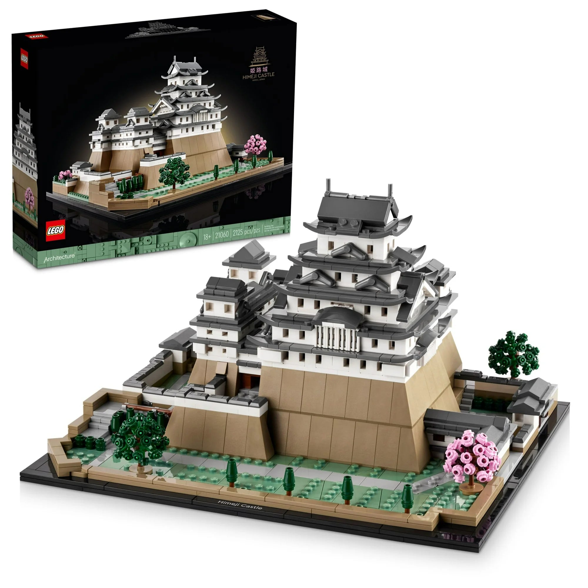 LEGO model of a castle with packaging in the background