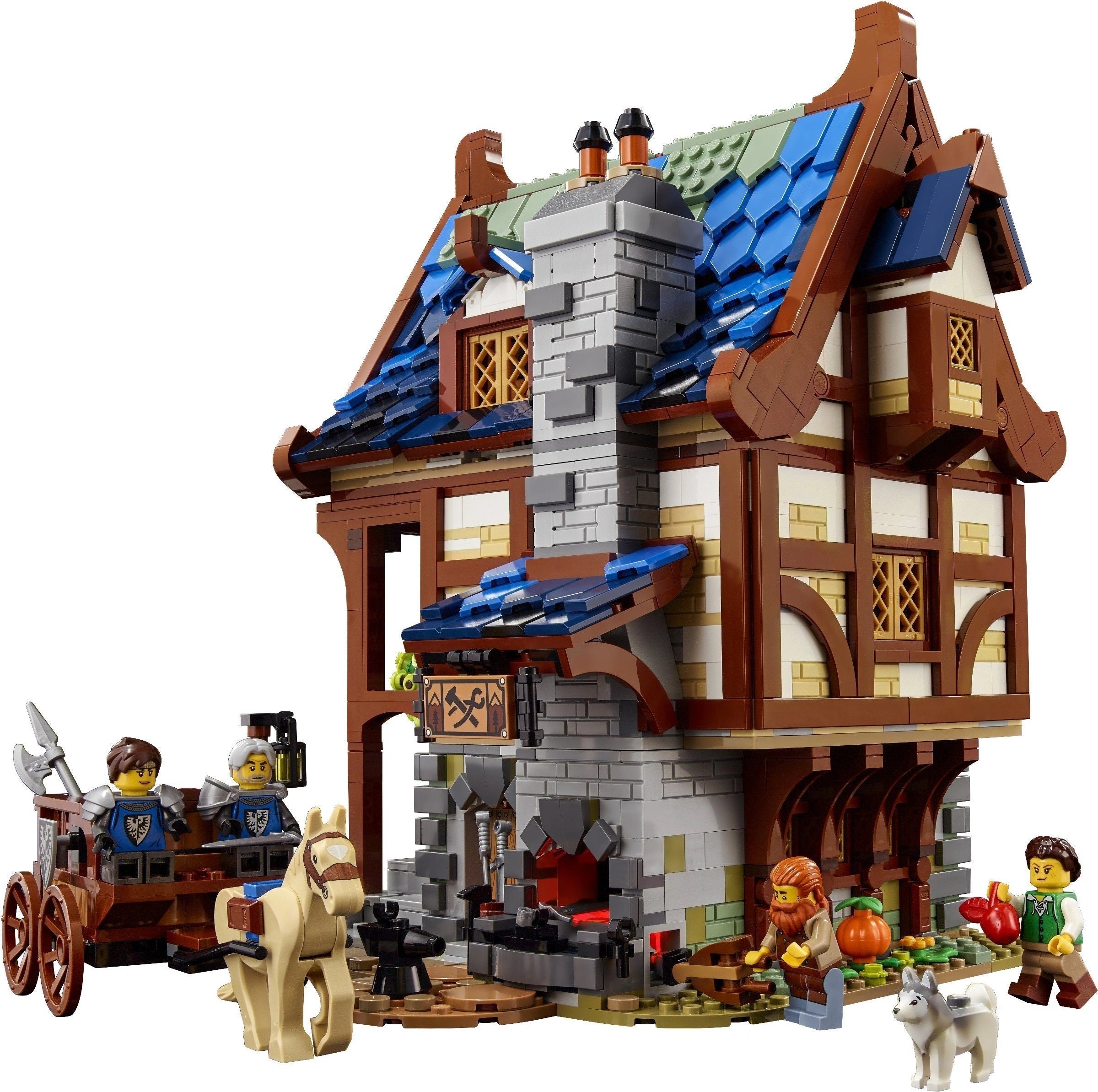 LEGO model of a medieval-style house with characters and a cart on a white background