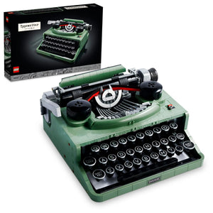 Green typewriter model with open lid showing internal components, displayed against a white background.