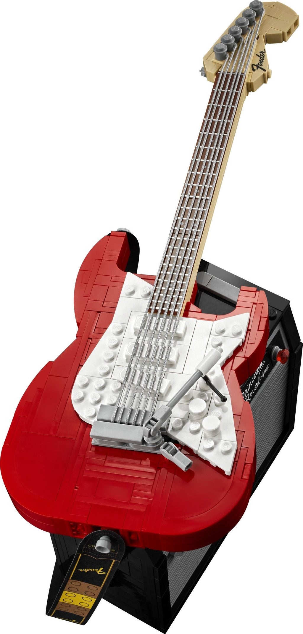 Red and white electric guitar made of interlocking bricks on a white background