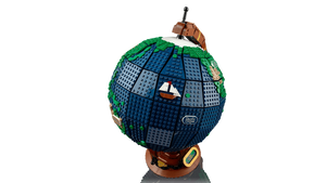 Model of a globe made from building blocks on a transparent background