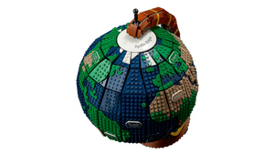 LEGO globe with a teapot on top on a white background