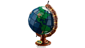Globe model made from interlocking bricks on a white background