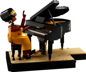 LEGO model of a man playing a grand piano on a white background