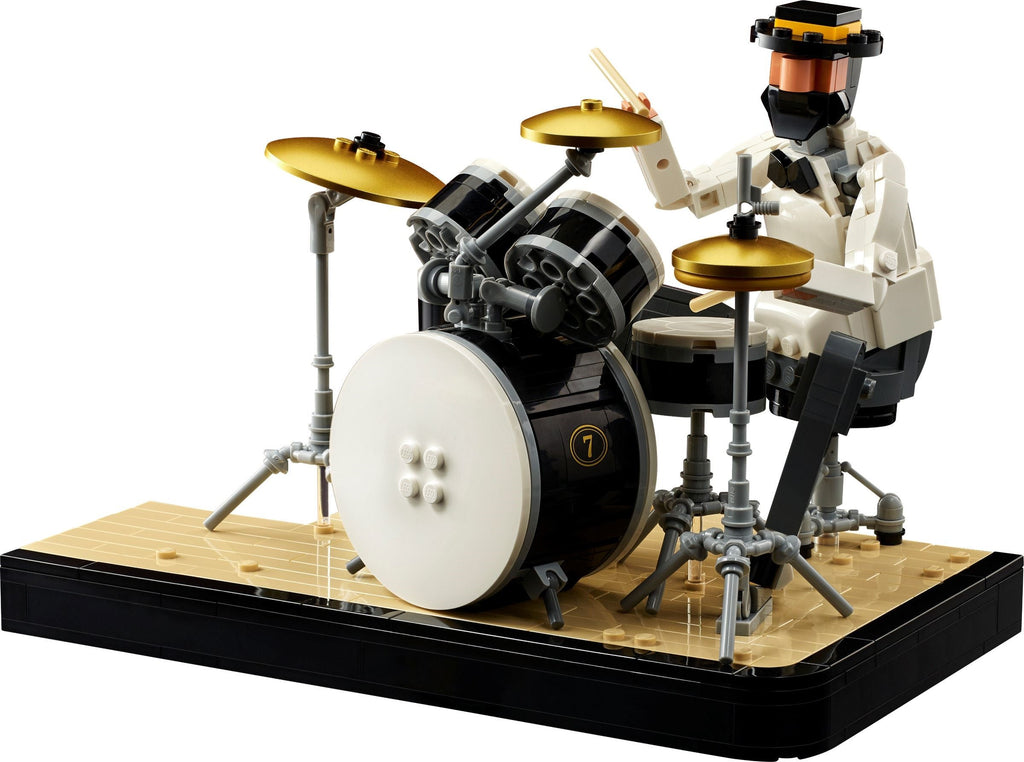 LEGO drum set with a drummer figure on a white background