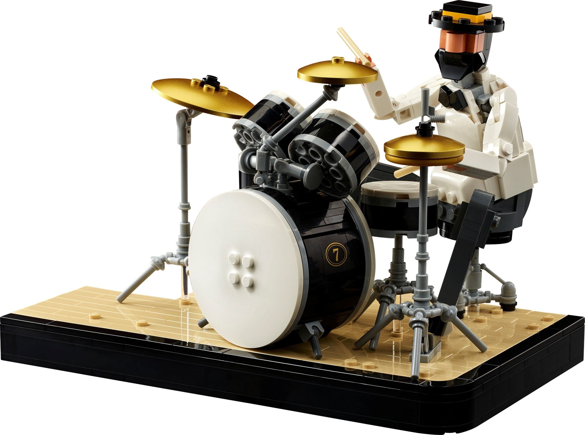 LEGO drum set with a drummer figure on a white background