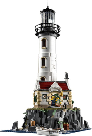 Model of a lighthouse made from interlocking bricks on a white background