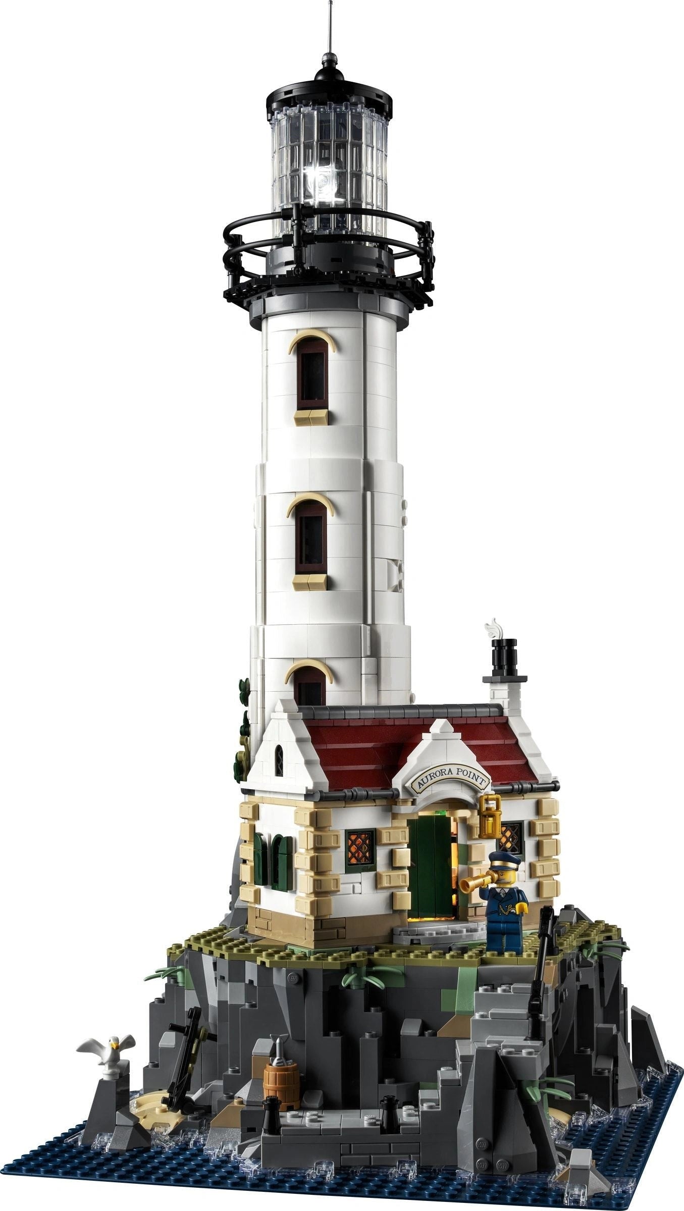 Model of a lighthouse made from interlocking bricks on a white background