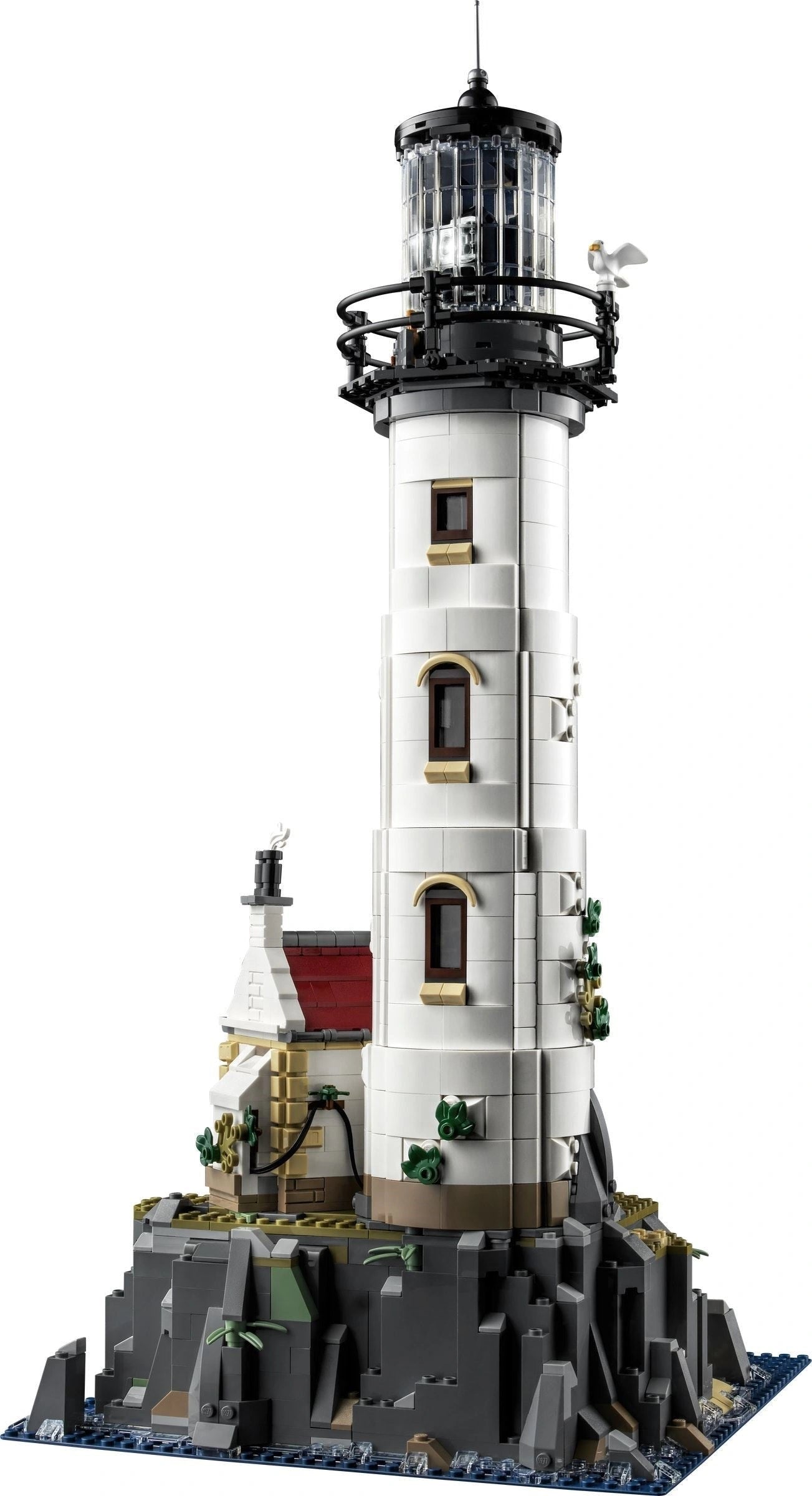 Model of a lighthouse made from building blocks on a white background
