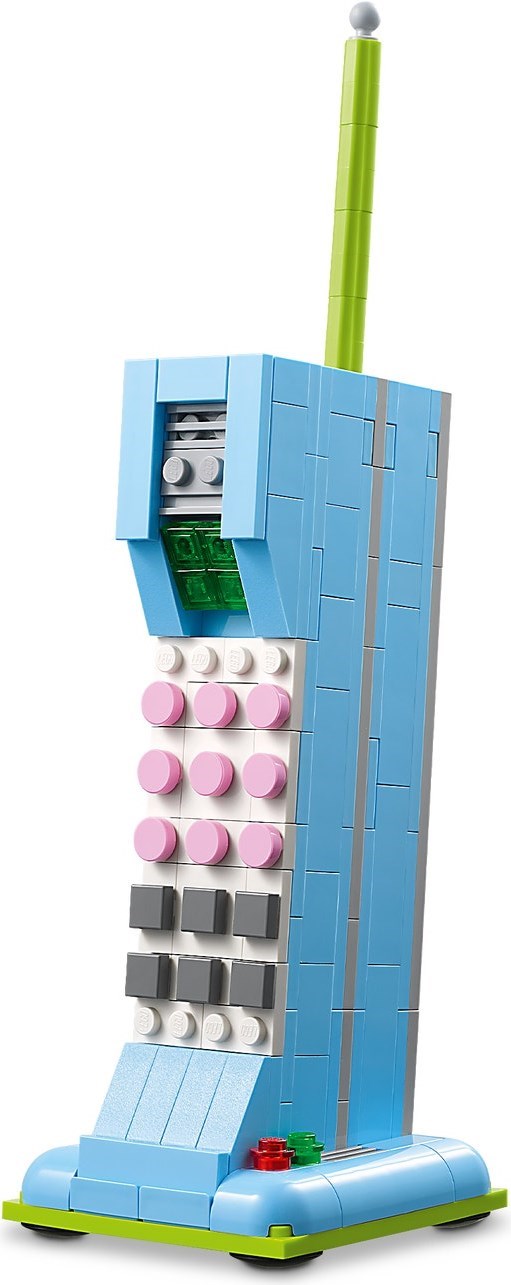 Toy building set resembling a phone with blue, pink, and gray blocks on a white background
