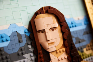 Close-up of a LEGO sculpture resembling 'La Gioconda' with a blurred background