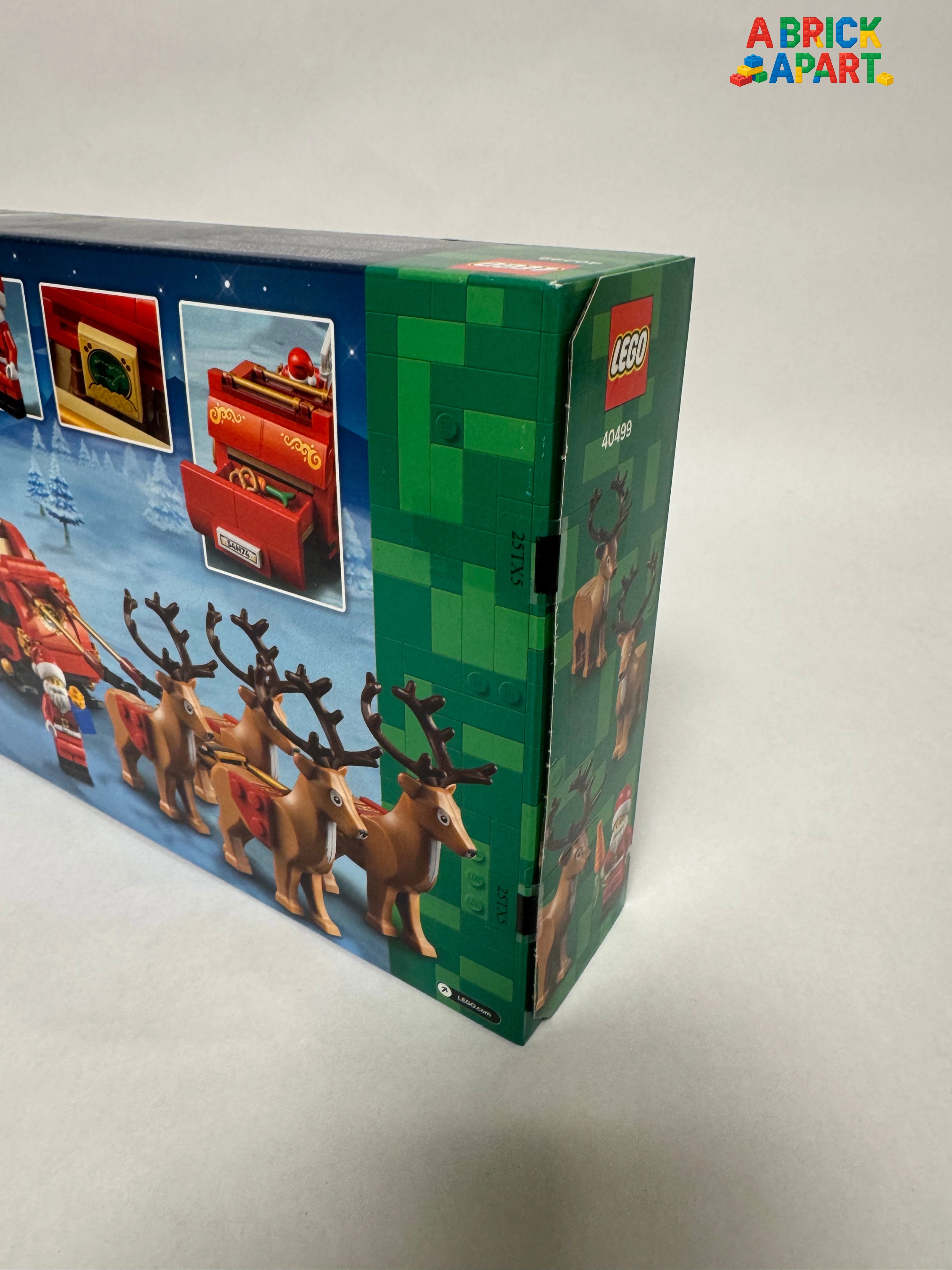 LEGO set packaging with reindeer and sleigh design on a white background