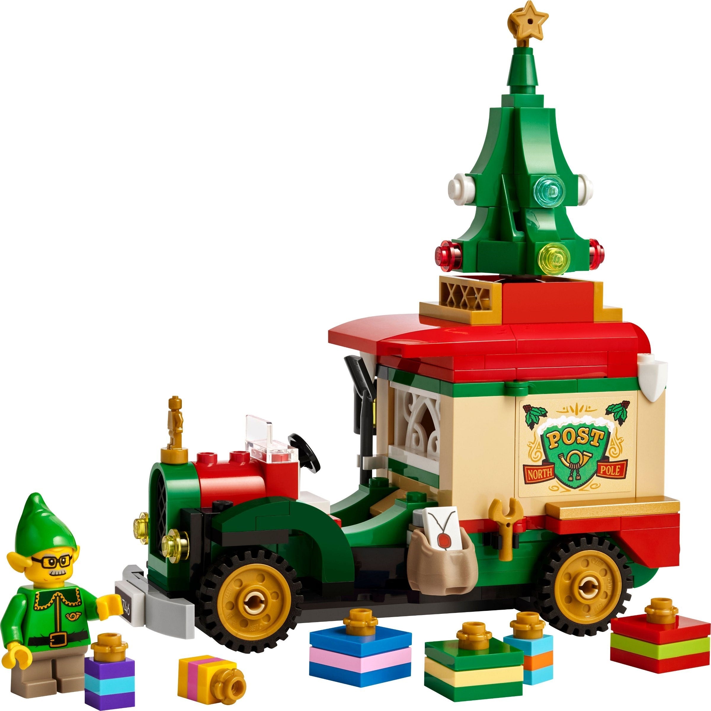 LEGO Christmas train set with a post office car and elf figure on a white background